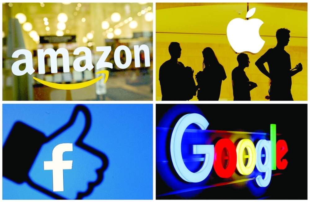 FILE PHOTO: The logos of Amazon, Apple, Facebook and Google