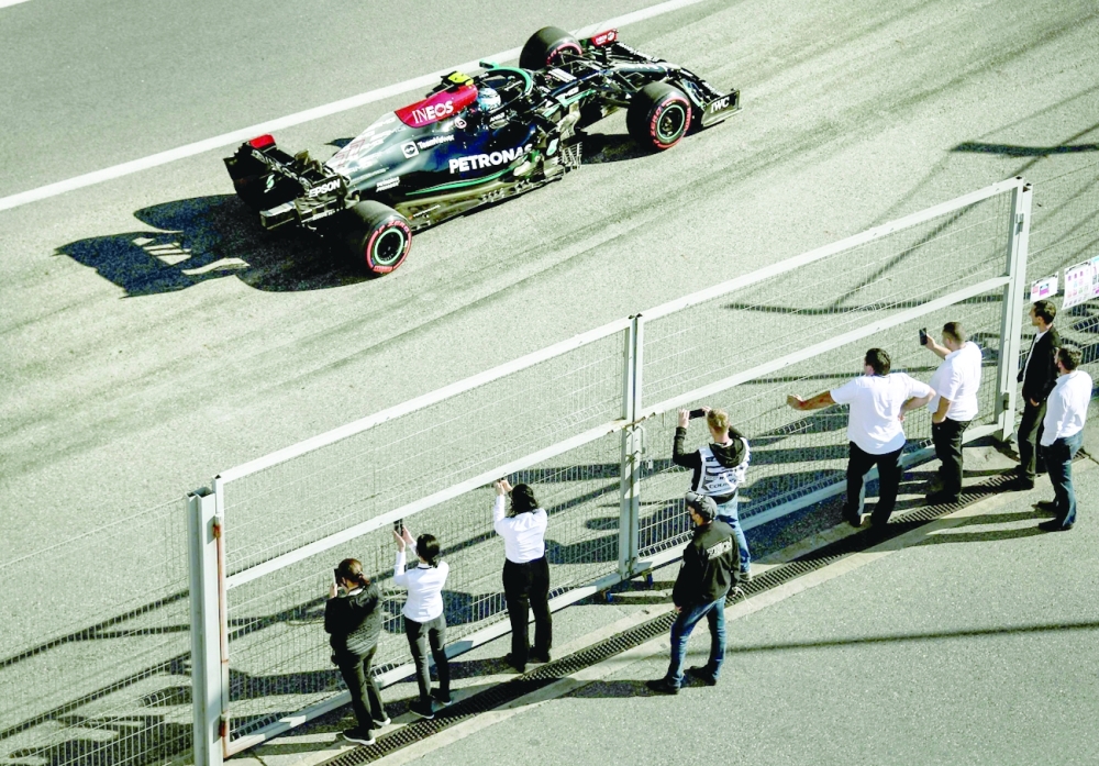 Mercedes' Valtteri Bottas steers his car during the second practice session for the Formula One Russian Grand Prix. -- AFP