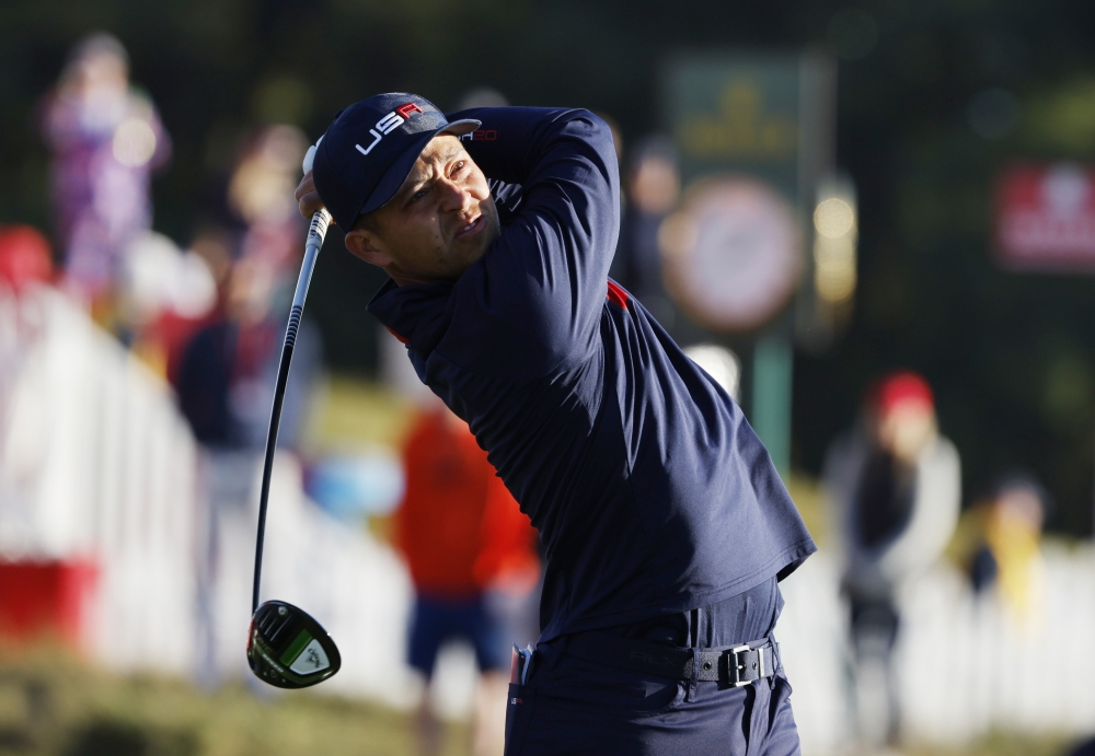 Team USA's Xander Schauffele hits his tee shot on the 2nd hole during the Foursomes. -- Reuters