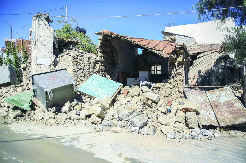 A demolished house following an earthquake in Arkalochori village on the Crete island. - AFP
