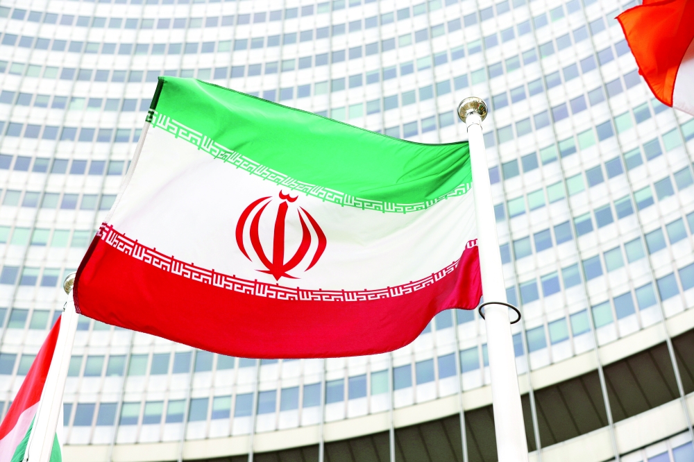 The Iranian flag waves in front of the International Atomic Energy Agency (IAEA) headquarters in Vienna, Austria. — Reuters
