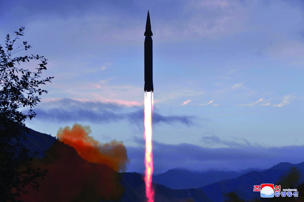 The newly developed hypersonic missile Hwasong-8 is test-fired by the Academy of Defence Science of the DPRK in this undated photo released on Wednesday. — Reuters