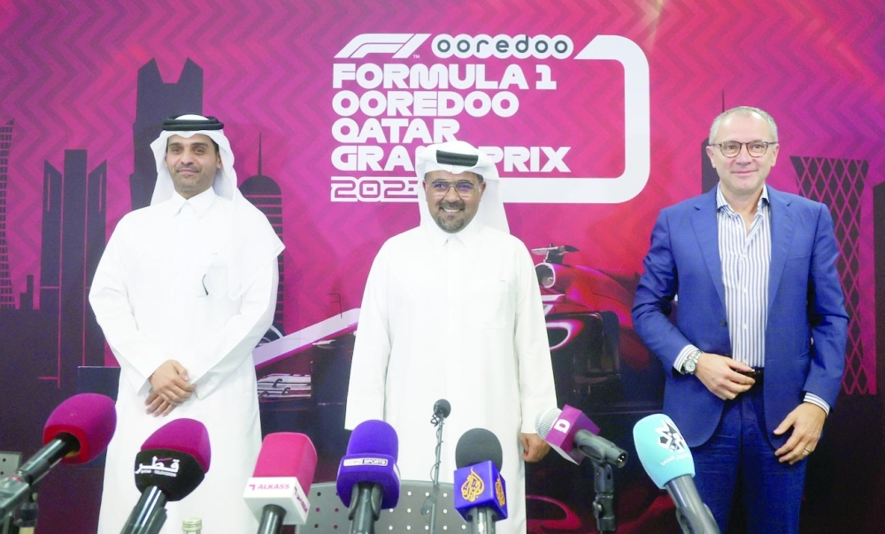 Sheikh Mohammed bin Abdulla al Thani, Deputy Group CEO and CEO of Qatar Ooredoo, Abdulrahman al Mannai, president of Qatar Motor and Motorcycle Federation, and Stefano Domenicali, CEO of the Formula One Group, after a press conference to announce that Qatar will host a Formula One Grand Prix for the first time on November 21. -- Reuters