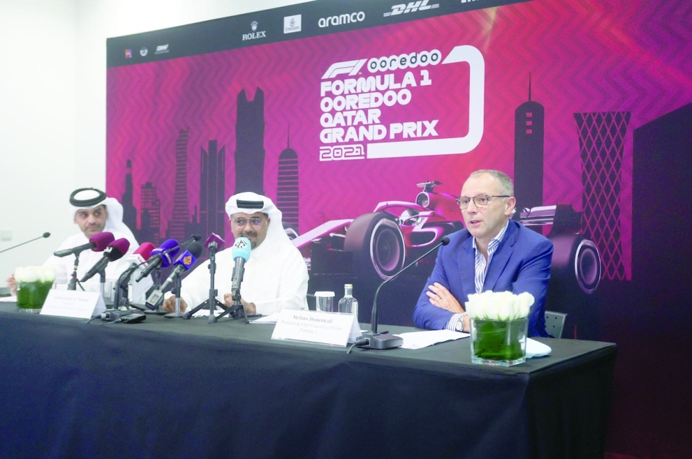 Sheikh Mohammed bin Abdulla al Thani, Deputy Group CEO and CEO of Qatar Ooredoo, Abdulrahman al Mannai, president of Qatar Motor and Motorcycle Federation, and Stefano Domenicali, CEO of the Formula One Group, during a press conference to announce that Qatar will host a Formula One Grand Prix for the first time on November 21. -- Reuters