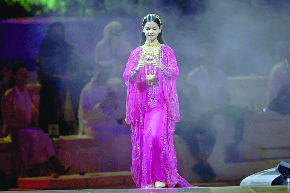 An Emirati artist performs during the opening ceremony of the Dubai Expo 2020.-- AFP