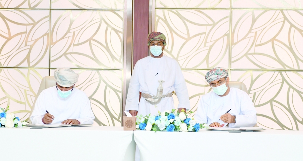 Dr Saud Hamoud al Habsi, Minister of Agriculture, Fisheries and Water Resources, signing the agreement in Muscat on Thursday.