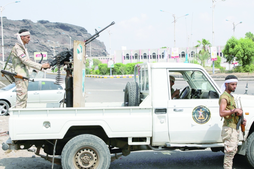 Members of the separatist Southern Transitional Council (STC) man a checkpoint in Aden. -- Reuters