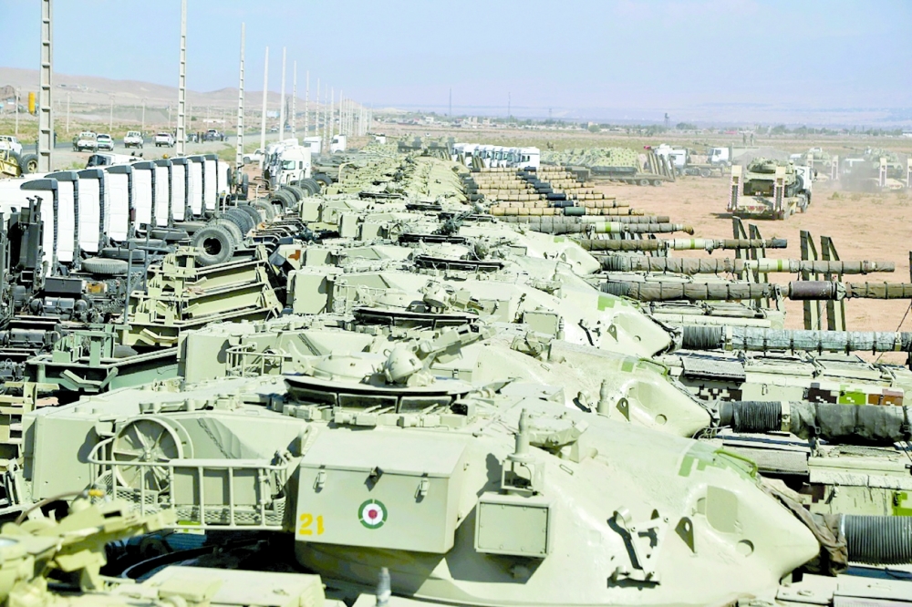 Military tanks are seen during an Iranian Army exercise dubbed 'Fatehan of Kheibar', in the northwestern parts of Iran. -- Reuters