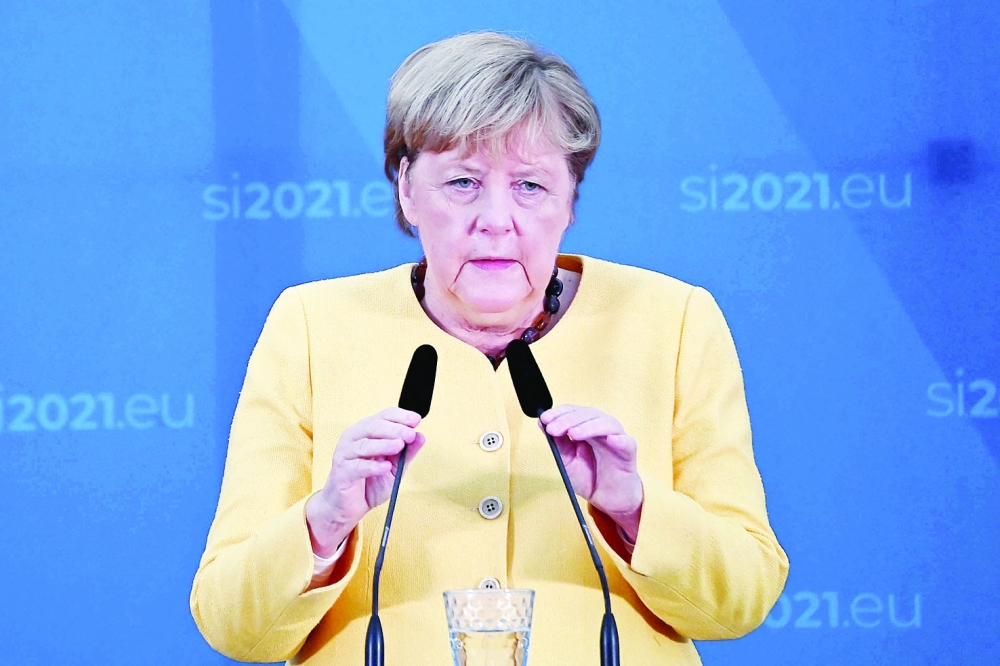 Germany's Chancellor Angela Merkel delivers a speech during a press conference at the EU-Western Balkans summit near Ljubljana. - AFP