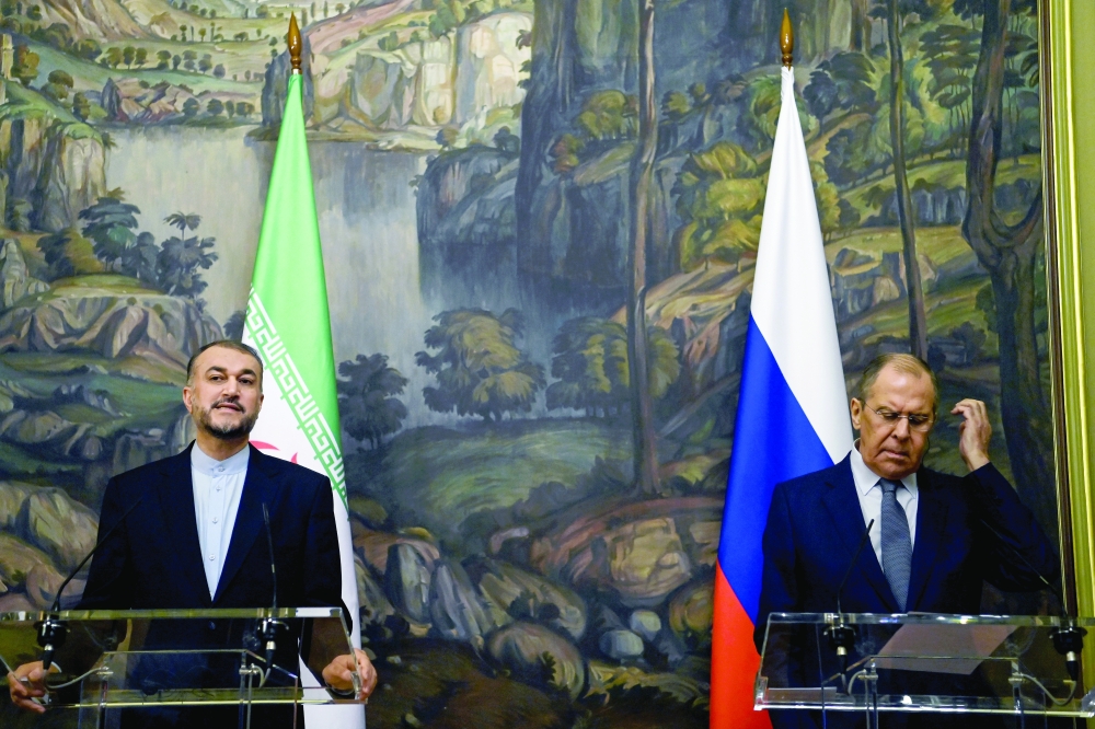 Russian Foreign Minister Sergei Lavrov and his Iranian counterpart Hossein Amir-Abdollahian hold a joint news conference following their meeting, in Moscow, on Wednesday. - Reuters