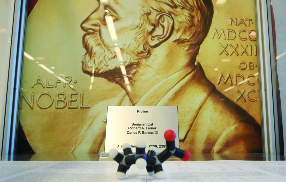 A sign mentions German scientist Benjamin List, after winning the 2021 Nobel Prize in Chemistry for the development of asymmetric organocatalysis together with David MacMillan, in Muelheim an der Ruhr, Germany, on Wednesday. - Reuters