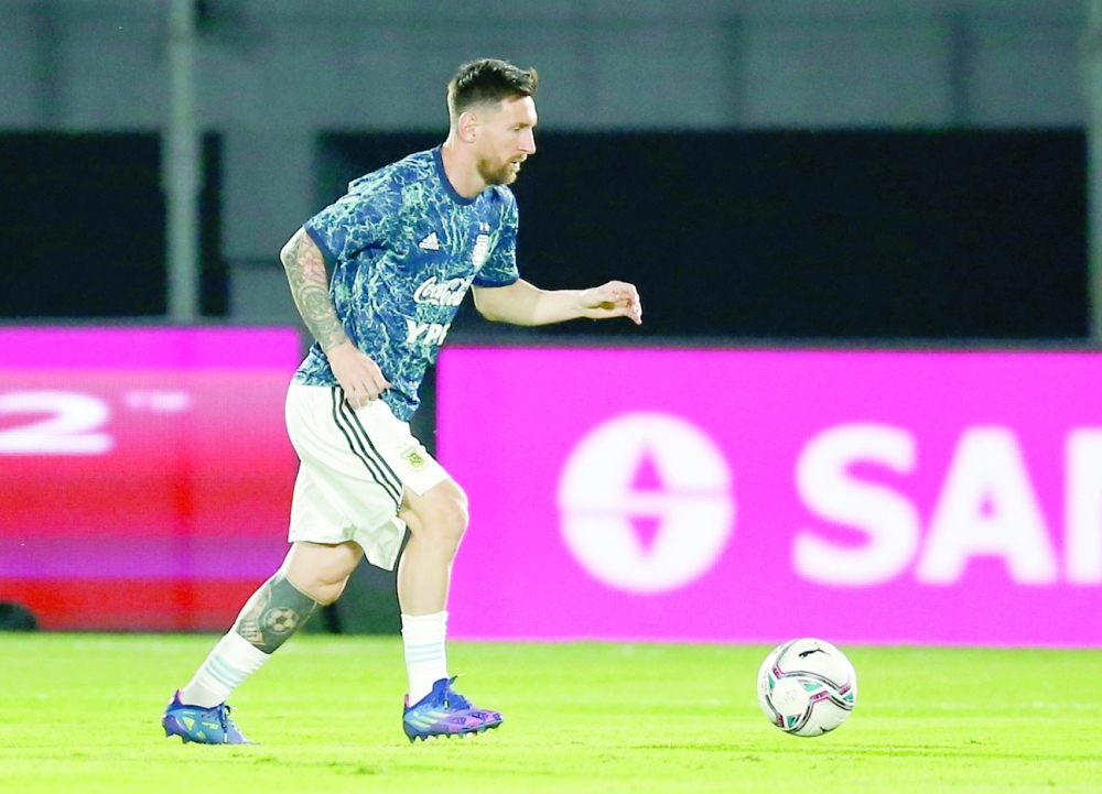 Argentina's Lionel Messi during the warm up before the match. -- Reuters