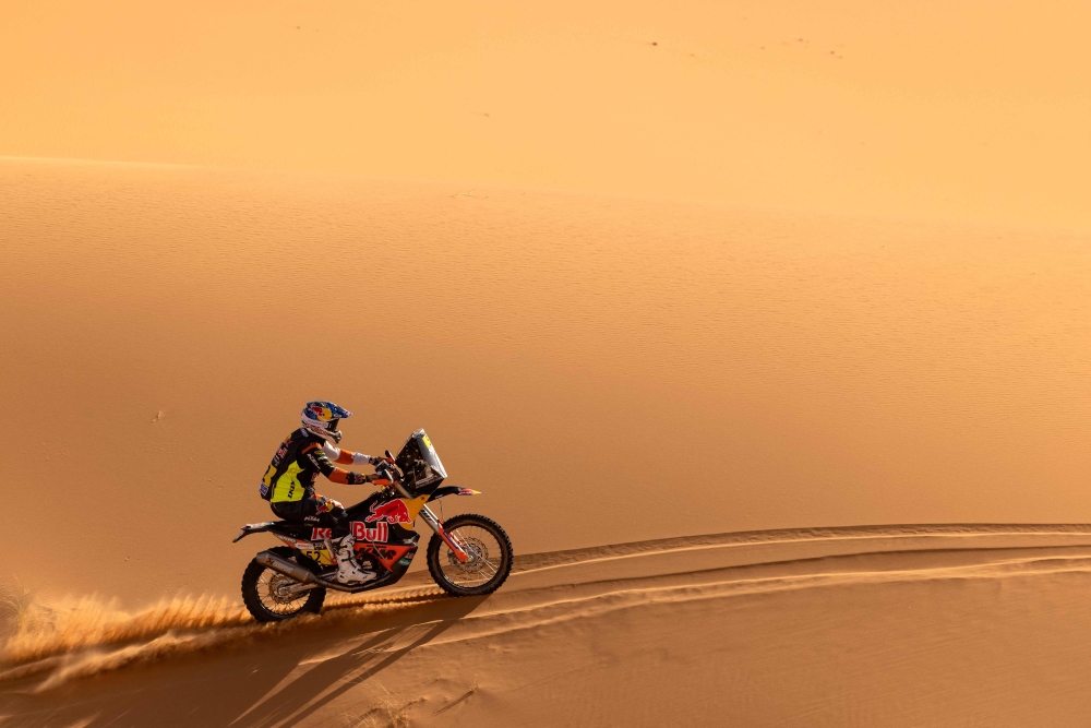 A participant competes in the Rally of Morocco 2021 in the region of Merzouga, on Sunday. - AFP
