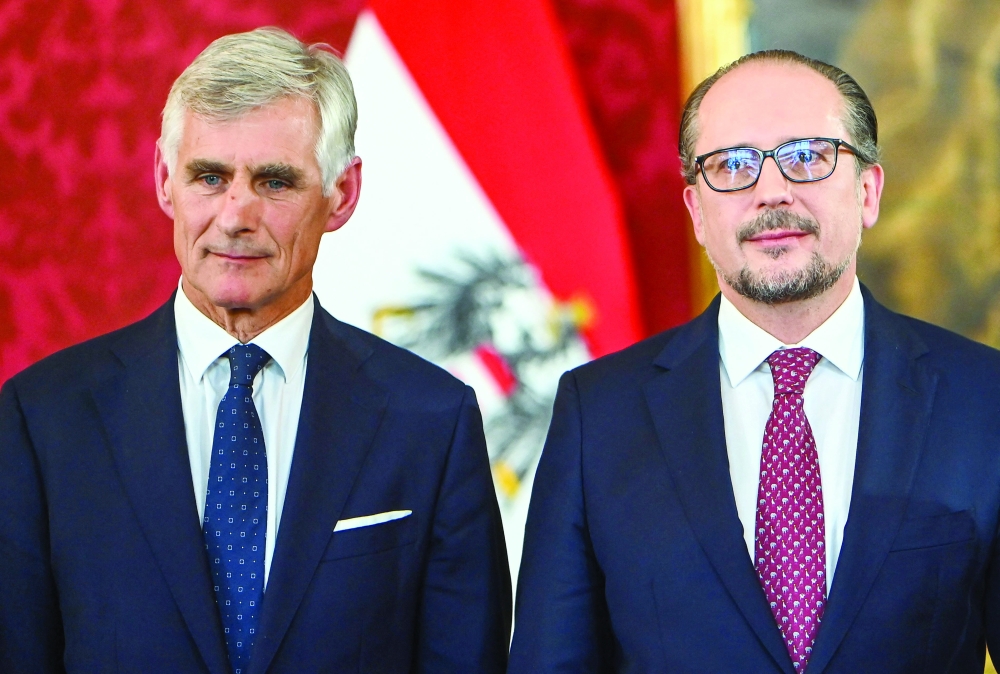 Austria's new Foreign Minister Michael Linhart and Austria's new Chancellor Alexander Schallenberg during a swearing-in ceremony at the presidential Hofburg Palace in Vienna. - AFP