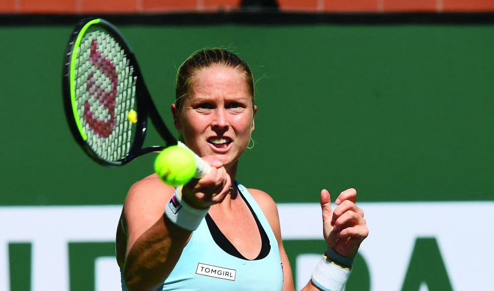 Shelby Rogers of the US hits a forehand return to Leylah Fernandez of Canada during their Round of 16 match at ATP-WTA Indian Wells tennis tournament on October 12, 2021 in Indian Wells, California. (Photo by Frederic J. BROWN / AFP)

