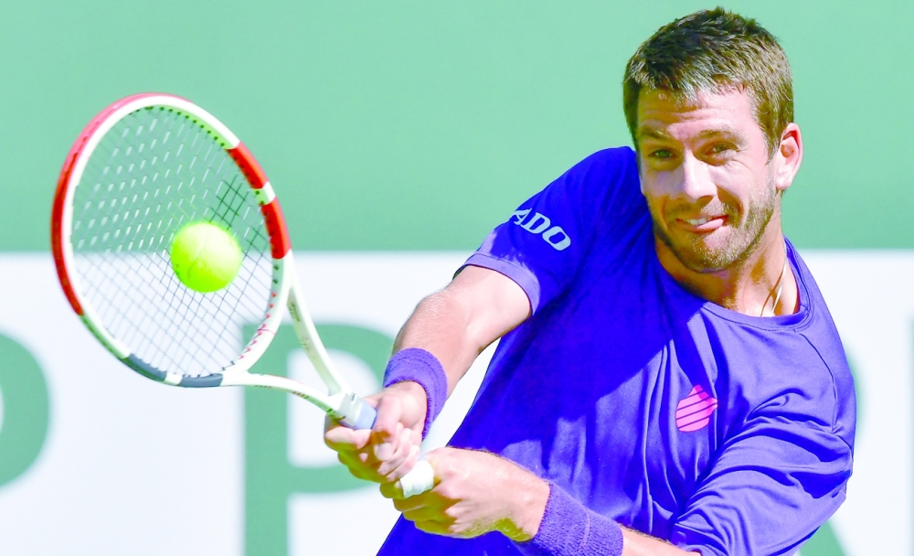 Cameron Norrie of Great Britain hits a backhand return to Diego Schwartzman of Argentina in their quarterfinal at the Indian Wells tournament. -- AFP

