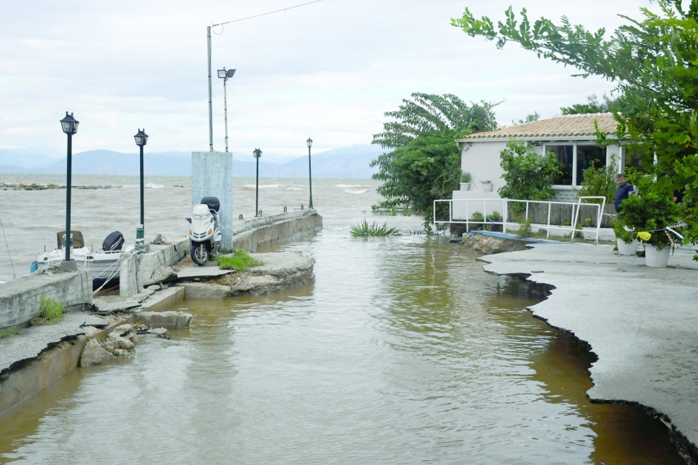 View of the damaged promenade of the village of Mesoggi, following heavy rainfall on the island of Corfu in Greece. -- Reuters
