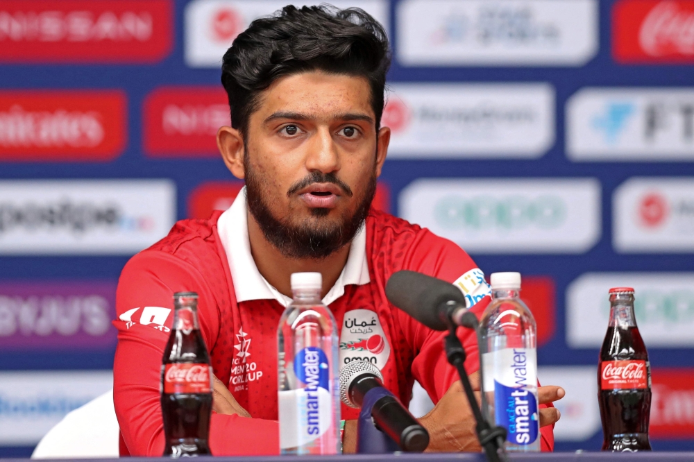 Oman's captain Aqib Ilyas attends a press conference at the al-Amerat Cricket Stadium in Muscat on October 16, 2021
