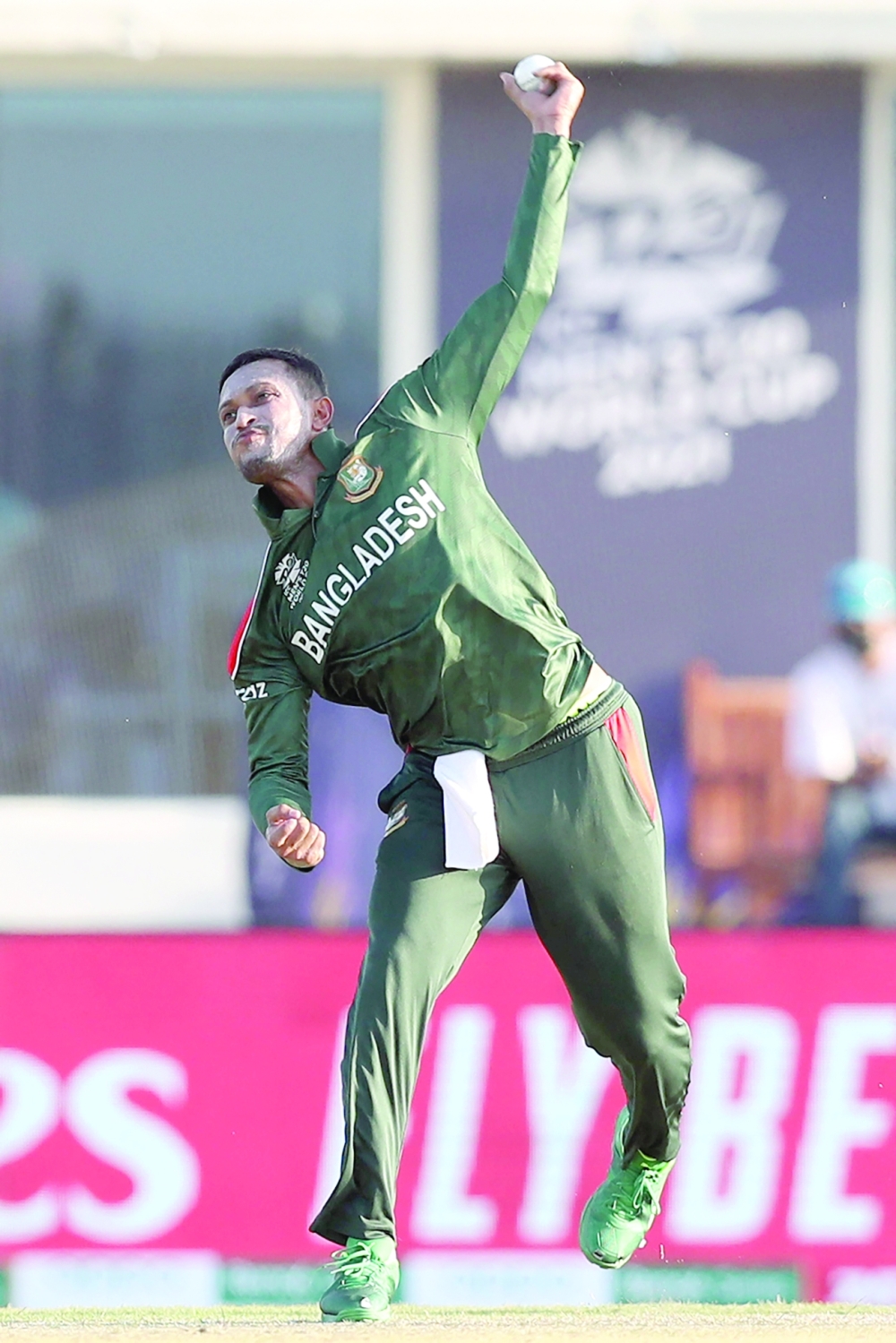Bangladesh's Shakib Al Hasan delivers a ball during the ICC men's Twenty20 World Cup cricket match between Bangladesh and Papua New Guinea at the Oman Cricket Academy Ground in Muscat on October 21, 2021. (Photo by Haitham AL-SHUKAIRI / AFP)

