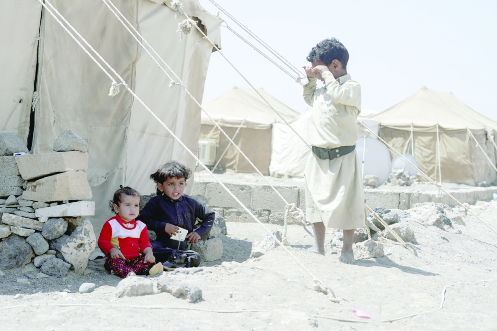 Children are pictured at a camp for internally displaced people (IDPs) on the outskirts of Marib city, on October 16. - Reuters