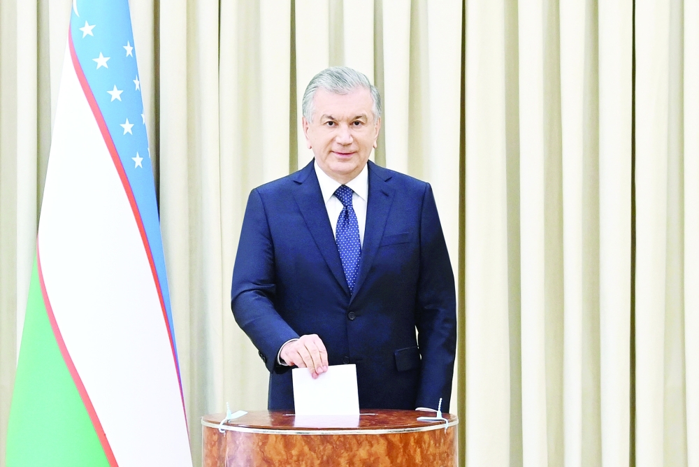 Uzbekistan's President Shavkat Mirziyoyev casts a ballot at a polling station during a presidential election in Tashkent. - Reuters
