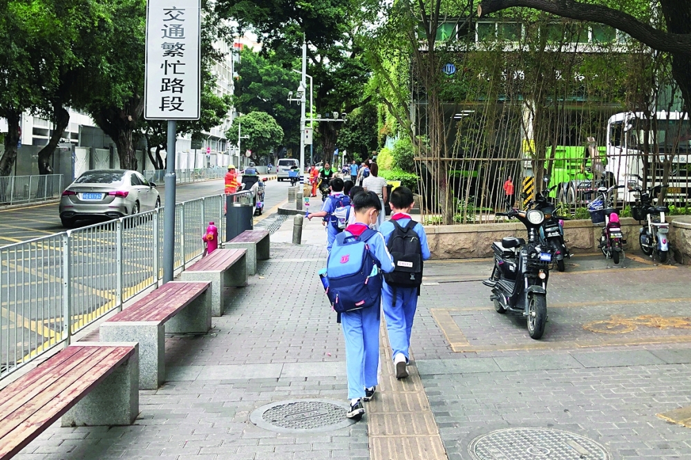 Children leave a school in Shekou area of Shenzhen, Guangdong province, China. - Reuters file photo