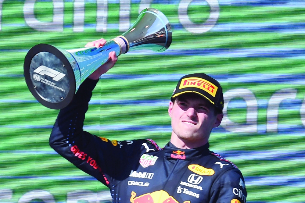 Red Bull driver Max Verstappen celebrates on the podium winning the Formula One United States Grand Prix at the Circuit of The Americas in Austin, Texas. -- Reuters