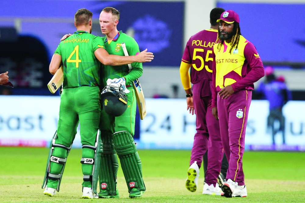 South Africa's Aiden Markram (L) and Rassie van der Dussen celebrate their victory. -- AFP