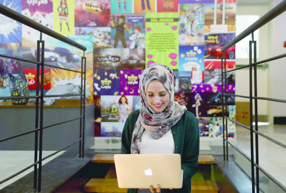 A developer is pictured at the offices of Tamatem in Amman. - AFP