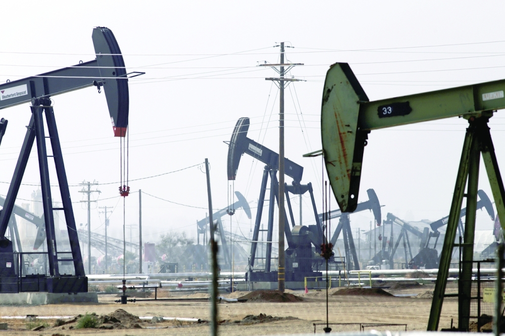 FILE PHOTO: Oil drills are pictured in the Kern River oil field in Bakersfield