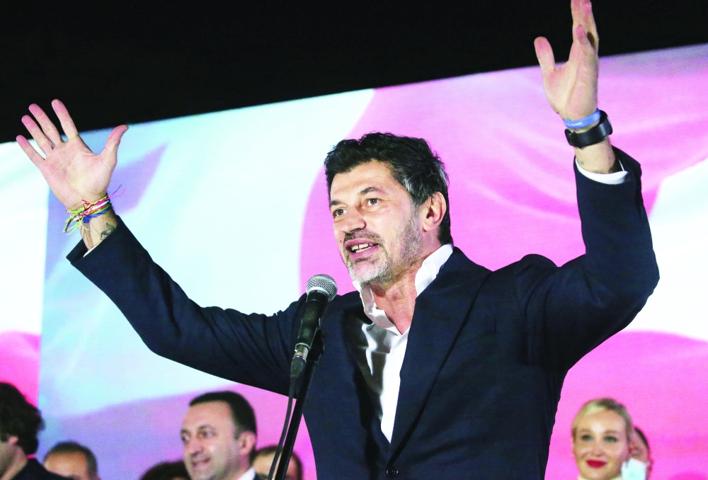 Tbilisi Mayor Kakha Kaladze addresses supporters after the polls close in the second round of the municipal elections in Tbilisi. - Reuters
