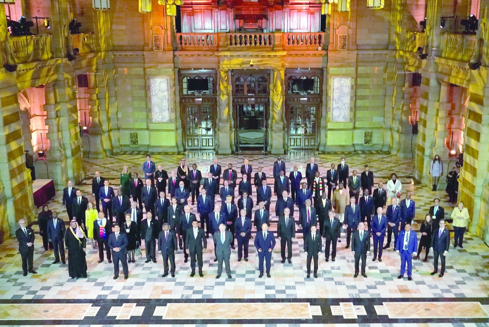 World Leaders pose at an evening reception to mark the opening day of COP26 on the sidelines of the COP26 UN Climate Change Conference in Glasgow. - AFP