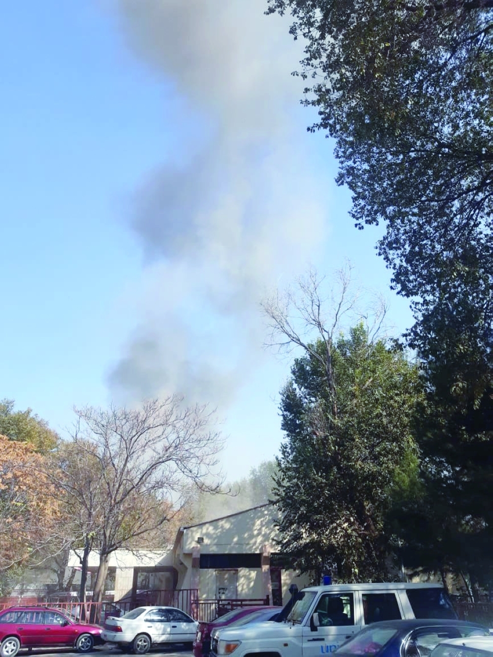 Smoke billows near the Sardar Mohammad Daud Khan National Military Hospital after an explosion in central Kabul, Afghanistan, on Tuesday. - Reuters