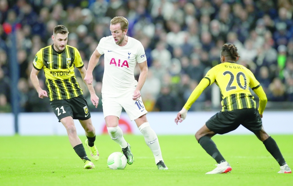 Tottenham Hotspur's Harry Kane in action with Vitesse Arnhem's Matus Bero and Yann Gboho. -- Reuters