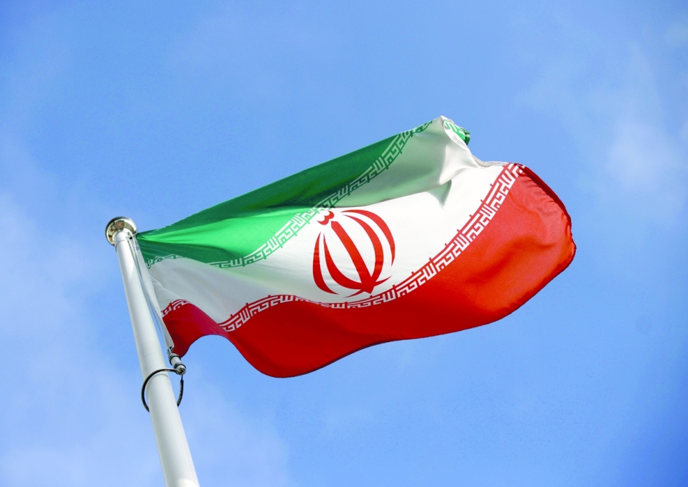 The Iranian flag flutters in front of the International Atomic Energy Agency headquarters in Vienna. - Reuters file photo