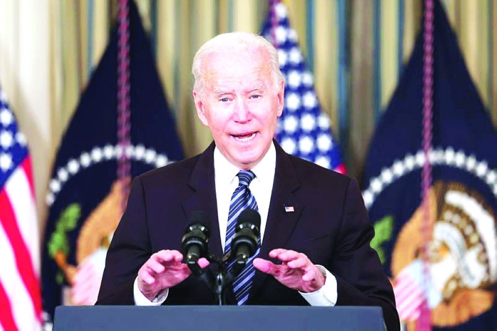 US President Joe Biden delivers remarks on the October jobs report at the White House in Washington. — Reuters