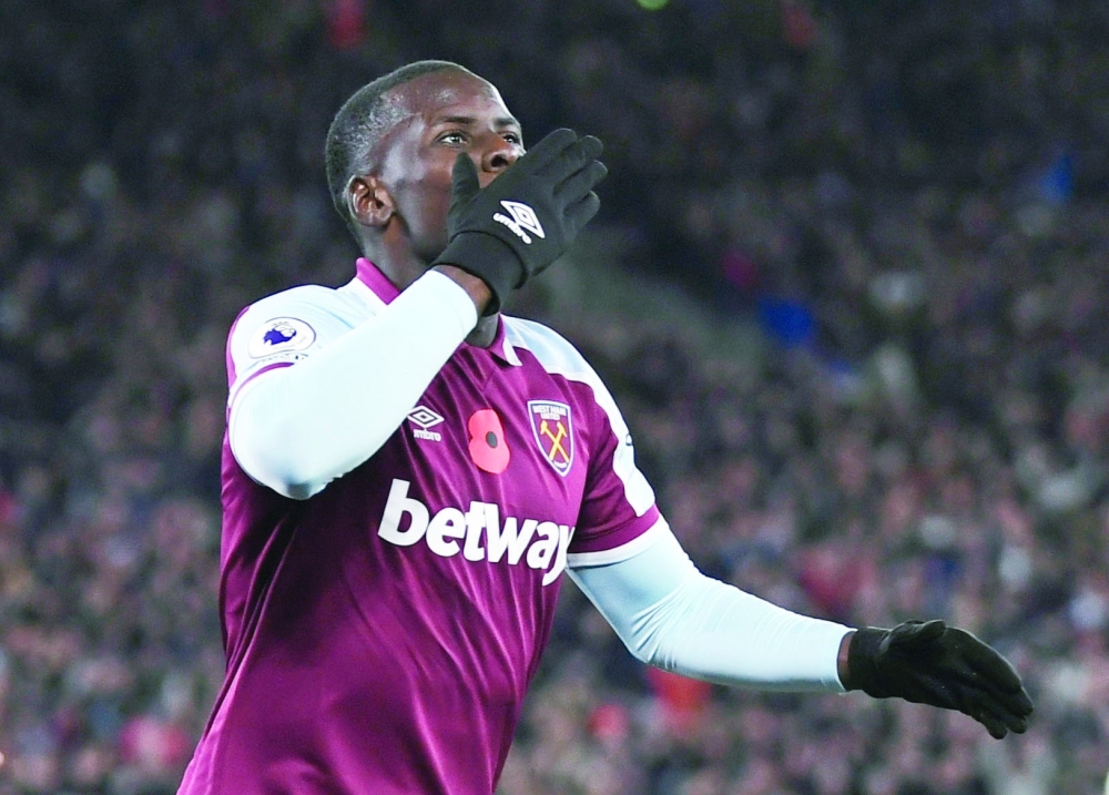 West Ham United's Kurt Zouma celebrates scoring their third goal. -- Reuters