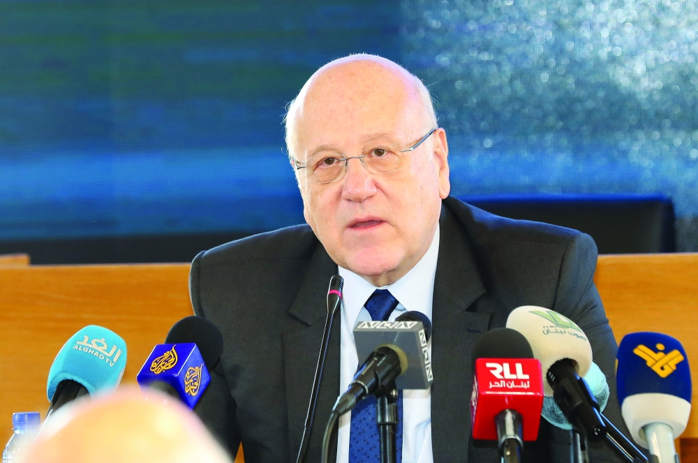 Lebanese Prime Minister Najib Mikati speaks at an economy conference, in Beirut, Lebanon, on Monday. - Reuters
