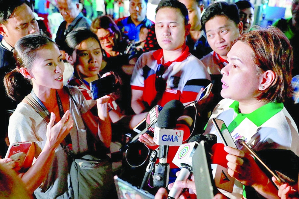 Rappler reporter Pia Ranada interviews Davao City Mayor Sara Duterte after a campaign sortie in Calamba City, Laguna, on March 9, 2019. - Reuters file photo