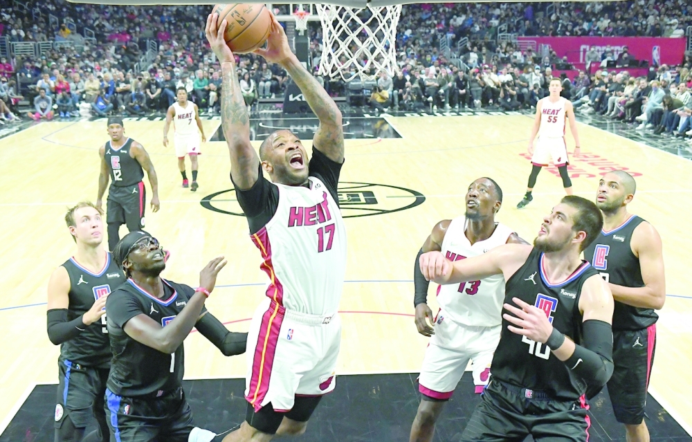 Miami Heat's Tucker (17) drives for a basket in the second half against the Los Angeles Clippers at Staples Center. -- USA Today Sports
