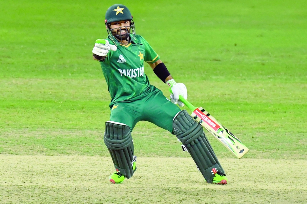 Pakistan's Mohammad Rizwan reacts as he takes a run. -- AFP