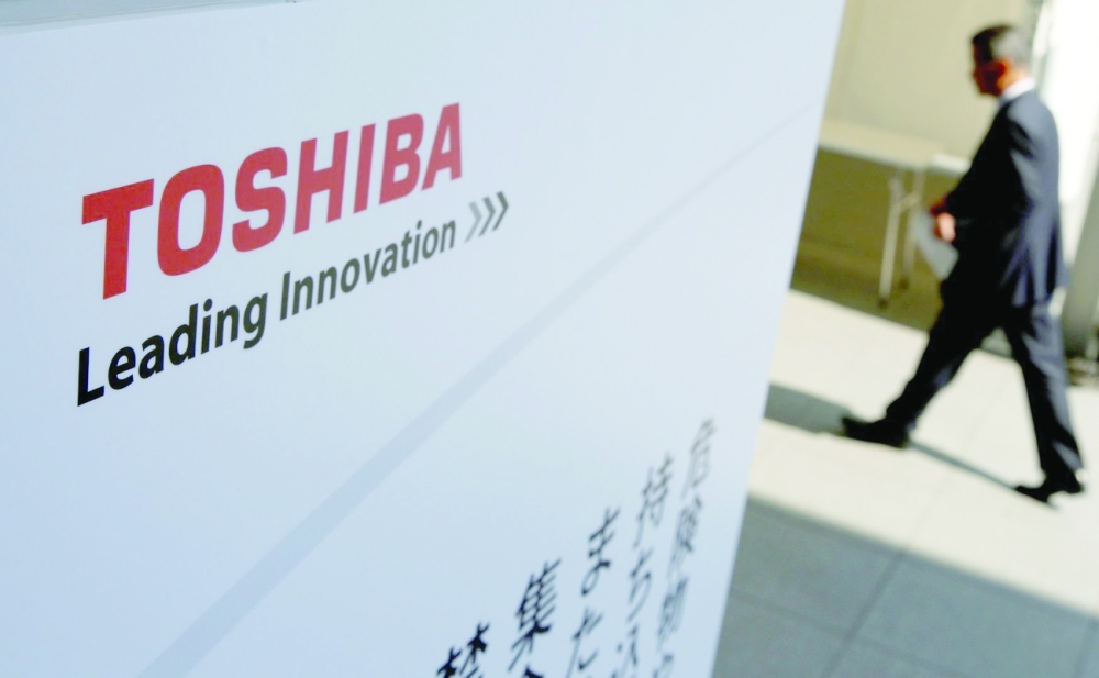 Japan's Toshiba to split into three firms