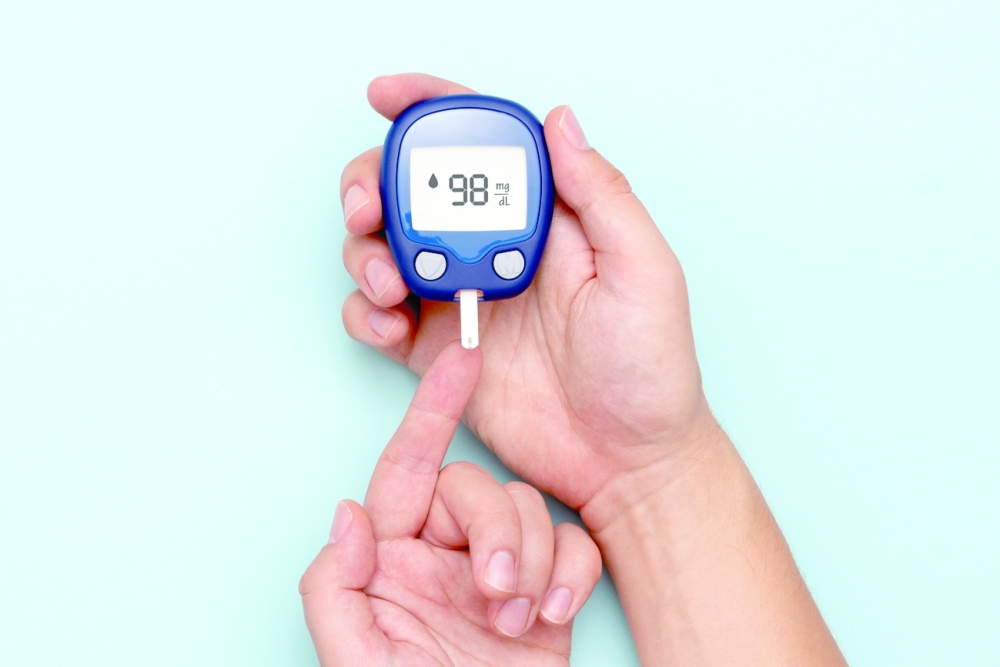 Man,Using,Glucometer,,Checking,Blood,Sugar,Level.,Diabetes,Concept,On