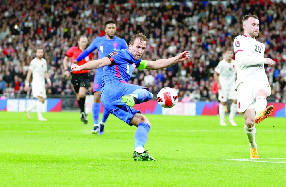 England's Harry Kane shoots at goal. -- Reuters