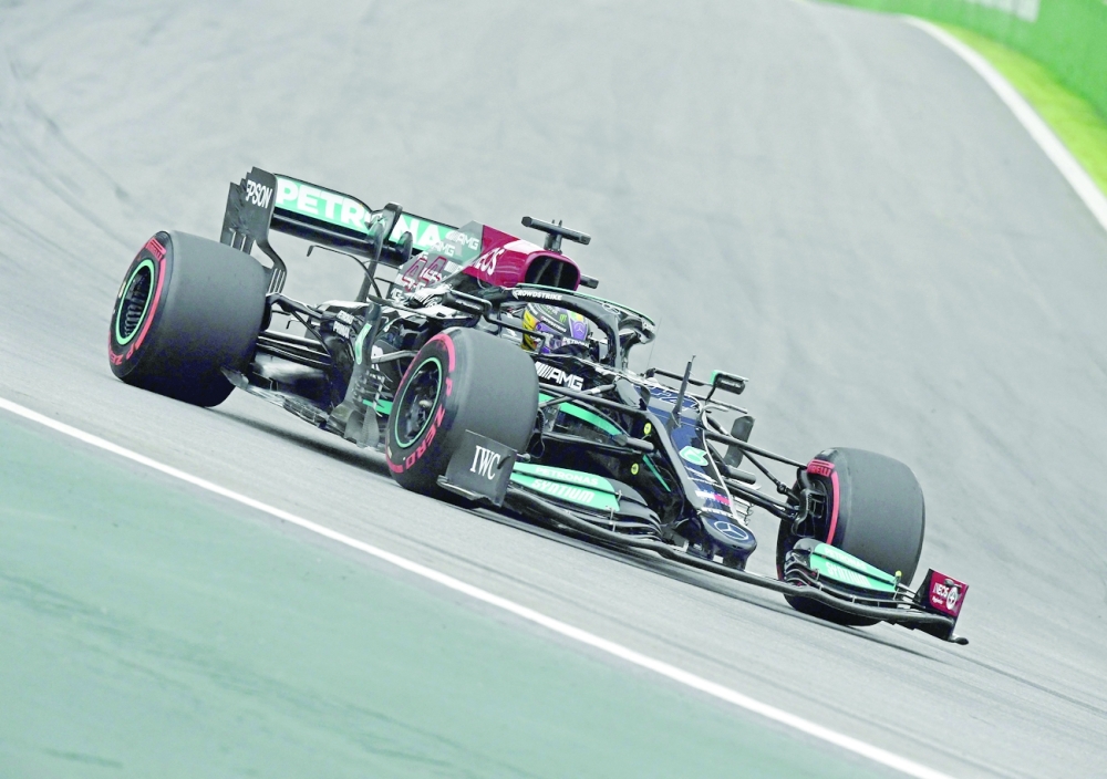 Mercedes' Lewis Hamilton powers his car during the qualifying session at the Autodromo Jose Carlos Pace, or Interlagos racetrack, in Sao Paulo. -- AFP