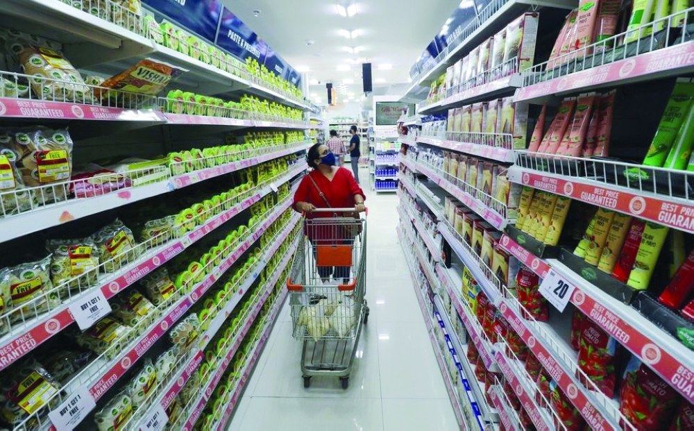 A woman shops inside a Big Bazaar retail store in Mumbai. — Reuters
