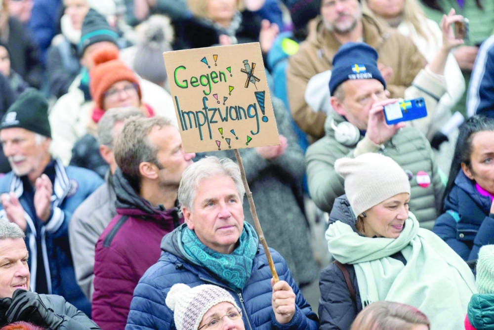 A demonstrator during an anti-vaccination protest at the Ballhausplatz in Vienna. - AFP 