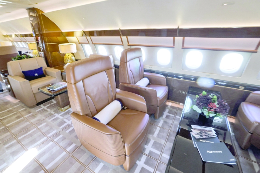 A view of the lounge interior of an Airbus ACJ320 aircraft at the 2021 Dubai Airshow. - AFP