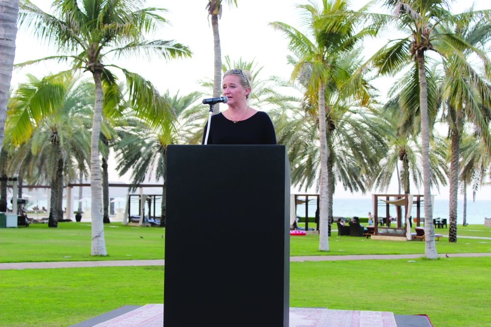 Kathleen Nejad addressing the audience