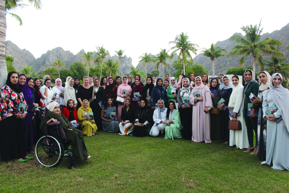 The successful Omani women posing